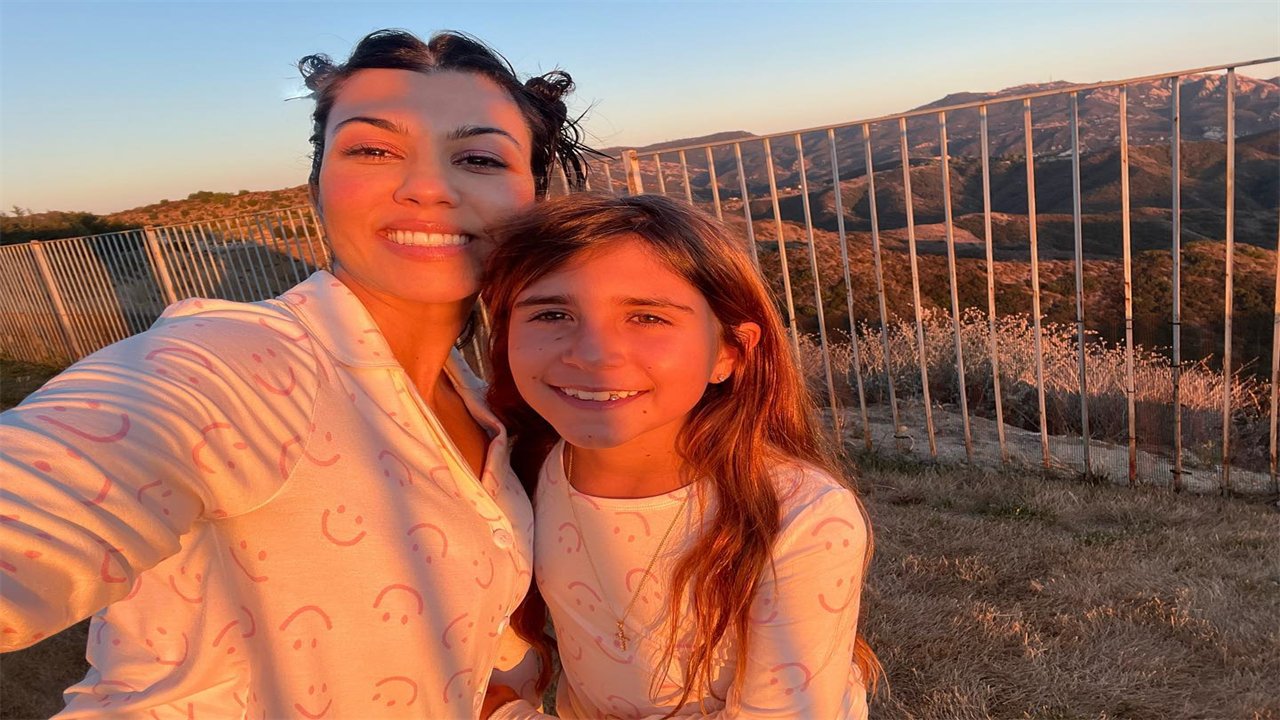 Kourtney Kardashian shows off REAL skin in rare makeup-free selfie with daughter Penelope, 10, outside $9M LA mansion