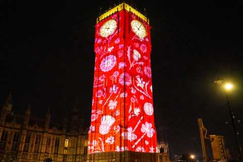 Big Ben shines in incredible bright lights and is covered in stunning projections to mark King..