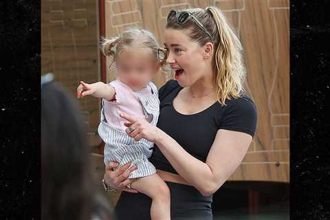 Amber Heard Hangs with Daughter in Madrid After 'Quitting Hollywood'
