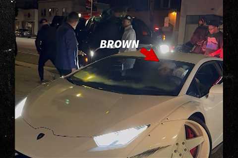 Chris Brown Scuffs Up His Lamborghini Leaving Hollywood Hot Spot