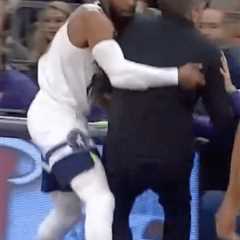 Timberwolves coach Chris Finch carried off court after sideline collision — serious knee injury..