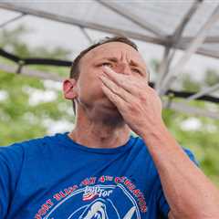 Joey Chestnut devours 57 hot dogs, helps raise $106K for military families in exhibition contest