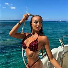 Ella Rae Wise stuns in tiny bikini as she showers off on a boat in Cyprus