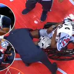 Wizards’ Carlton Carrington exits in wheelchair after hitting head on court in scary injury scene