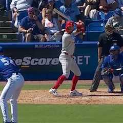 Blue Jays fan moons TV camera during spring training game as woman tries desperately to stop him