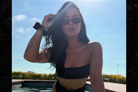 Demi Lovato Sizzles in New Black Bikini Pics, Takes Dip in Pool