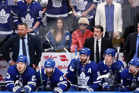 Justin & Hailey Bieber Cuddle Up While Cheering on the Toronto Maple Leafs at Stanley Cup Playoffs