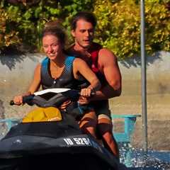 Sydney Sweeney Rides Jet Ski on Lake With Mystery Man Wrapped Around Her