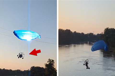 Paraglider Strikes Power Line, Crashes Into River in Wild Video