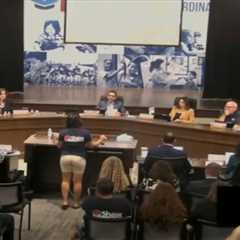 Forfeit over trans high school volleyball player sparks emotional board meeting as parents clash