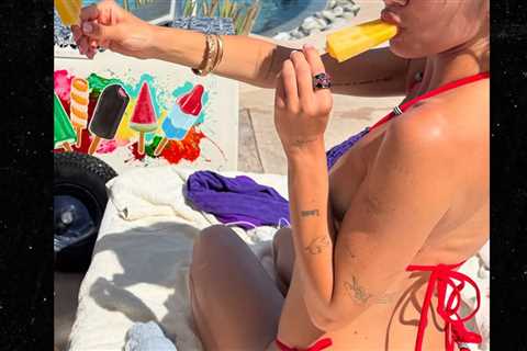 Guess the Summer Bum Coolin' Off in This Popsicle Pic!