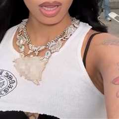 Guess The Rapper Showin' Off Her Big Bling!