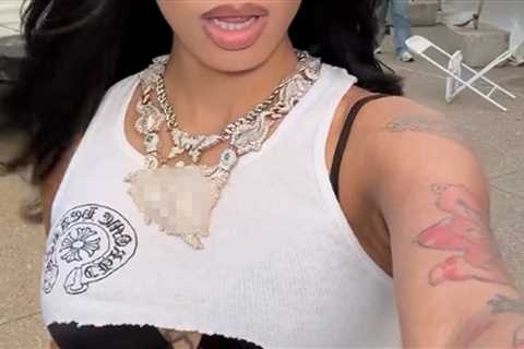 Guess The Rapper Showin' Off Her Big Bling!