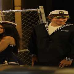 Justin Herbert and girlfriend Madison Beer twin as sailors for Halloween date night at Chargers..