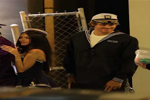 Justin Herbert and girlfriend Madison Beer twin as sailors for Halloween date night at Chargers..