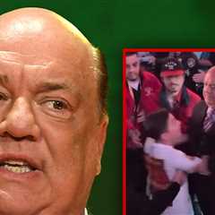 WWE Star Paul Heyman Shoves Young Fan Away From Logan Paul, on Video