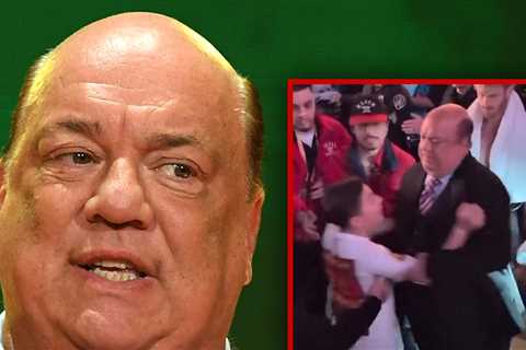 WWE Star Paul Heyman Shoves Young Fan Away From Logan Paul, on Video