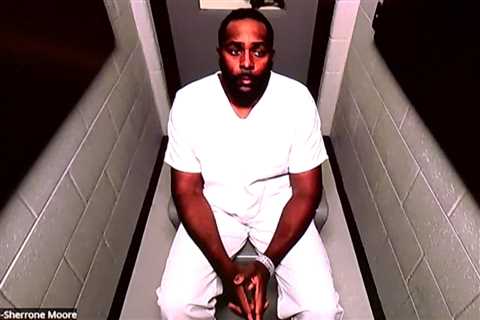 Ex-Michigan football coach Sherrone Moore seen in prison jumpsuit as he’s charged with felony