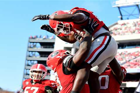 Two Georgia football players, including star freshman, arrested weeks before CFP game