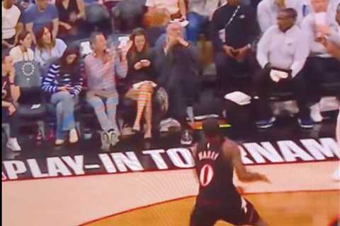 76ers fan pays painful price for staring at phone from front row during play-in game