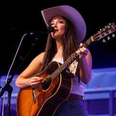Watch Kacey Musgraves Go Undercover As a Giant Armadillo To Buy Her New ‘Middle of Nowhere’ Album..