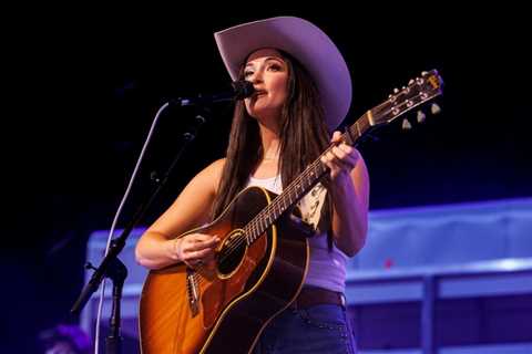 Watch Kacey Musgraves Go Undercover As a Giant Armadillo To Buy Her New ‘Middle of Nowhere’ Album..