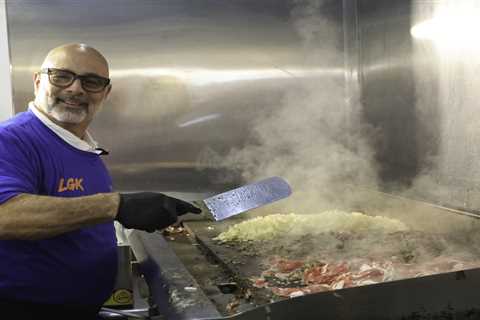 Owner of Philadelphia’s iconic Pat’s cheesesteaks forced to work in NY — wearing ‘Philly Sucks’..