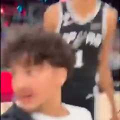 New angle shows fan storming court for selfie with smiling Victor Wembanyama in Knicks-Spurs NBA..