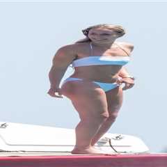 Bikini-clad Lindsey Vonn shows off her injured leg on yacht four months after horror crash