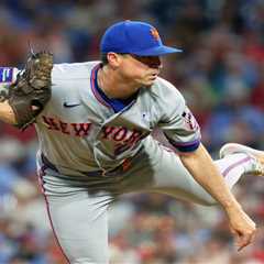 Mets-Cubs game postponed as pounding rain blankets Queens