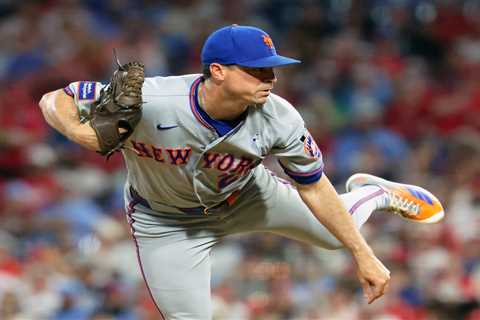 Mets-Cubs game postponed as pounding rain blankets Queens