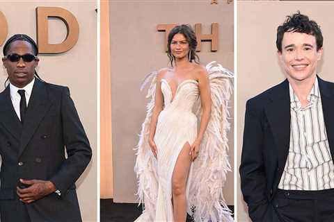 Travis Scott Is All Business in Sleek-Cut Suit at 'The Odyssey' NYC Premiere