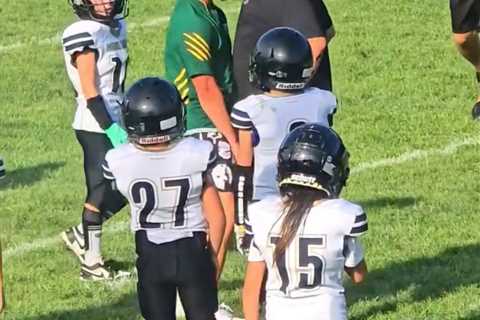 Kids football game descends into chaos as coaches trade blows in wild brawl